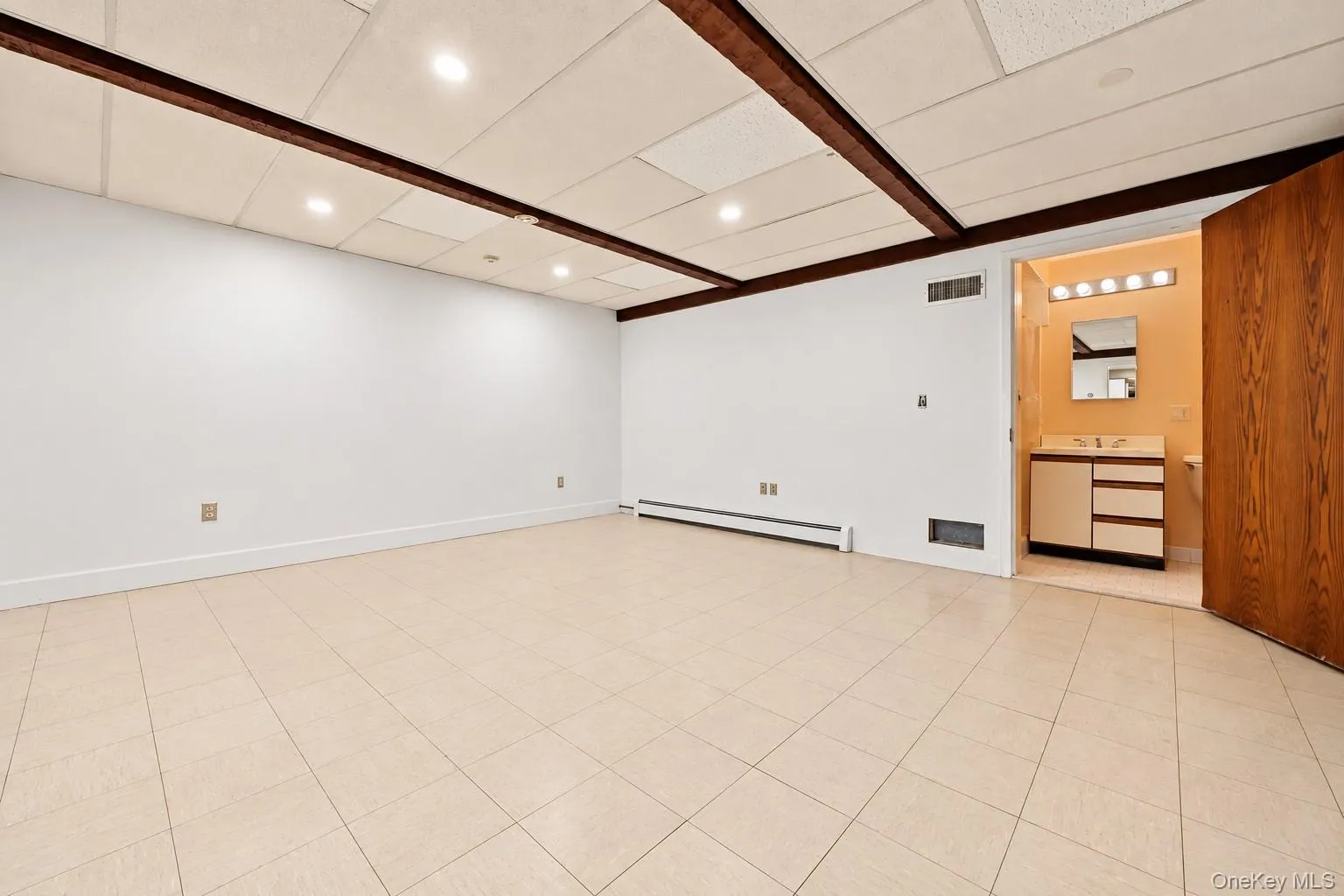 Another view of the office with private bath. Extraneous objects removed. Another view of the office with private bath. Extraneous objects removed.