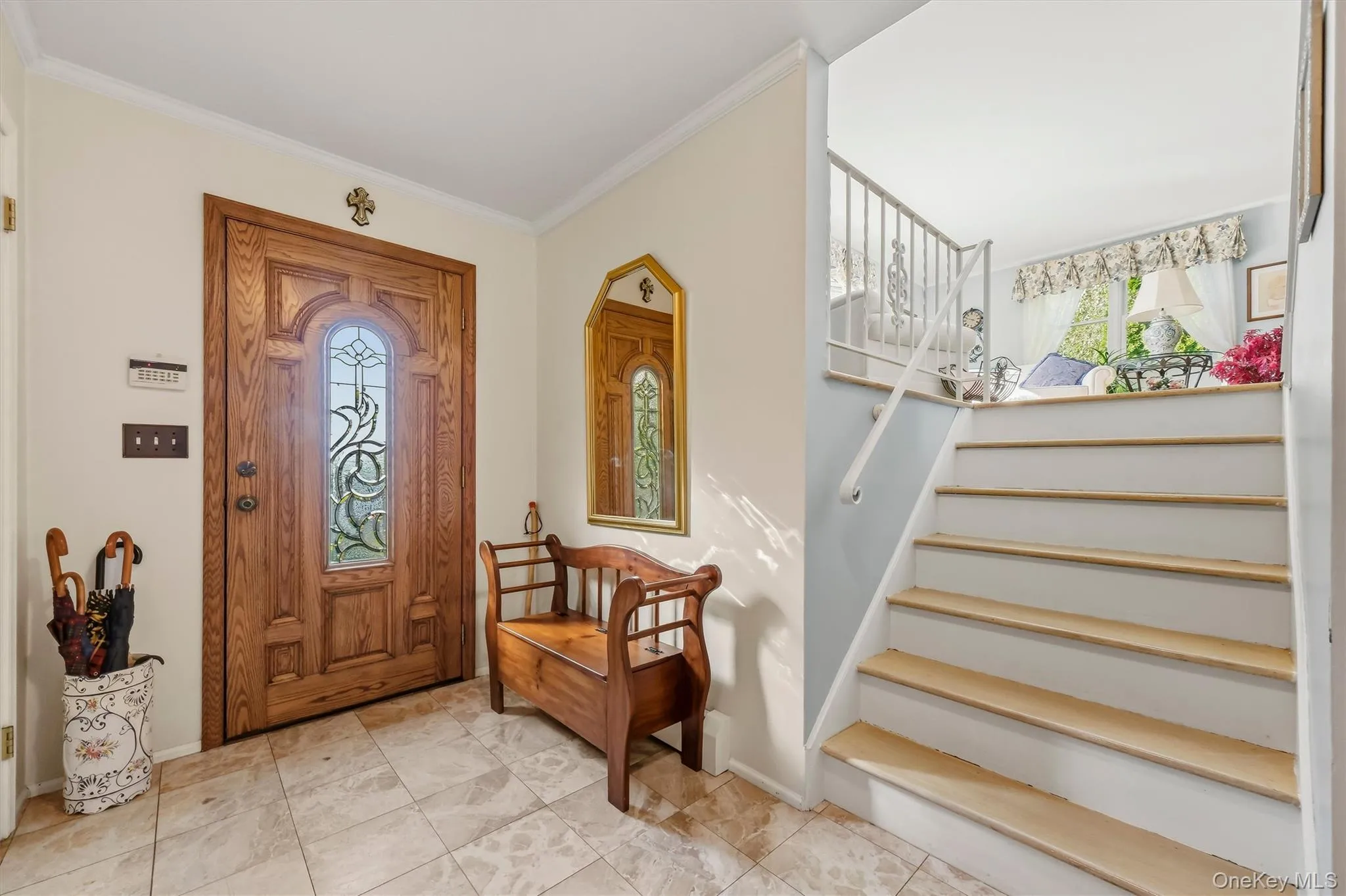 Bright and inviting foyer leading into the home Bright and inviting foyer leading into the home