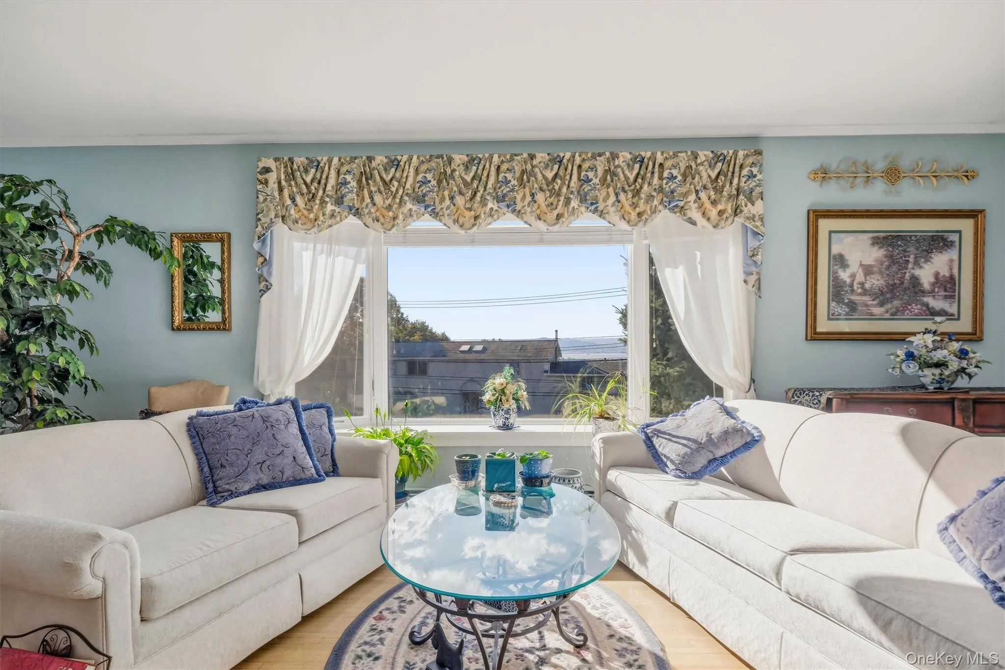 living room with scenic window views living room with scenic window views