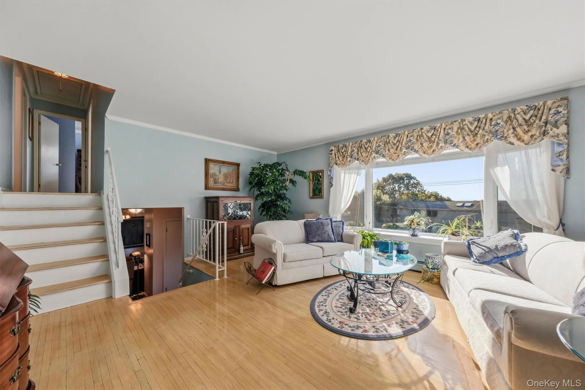 open concept with upper level staircase to bedrooms open concept with upper level staircase to bedrooms