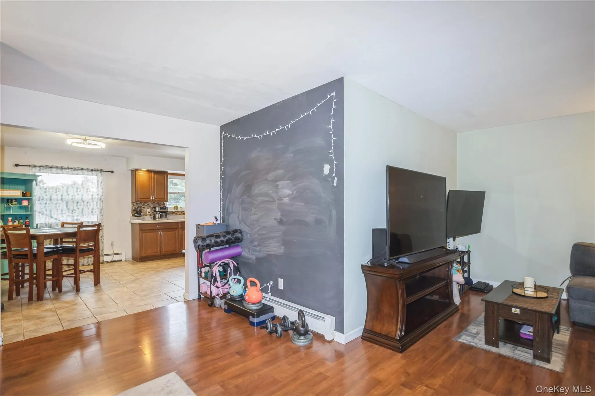 Open layout on second floor with living room and kitchen Open layout on second floor with living room and kitchen