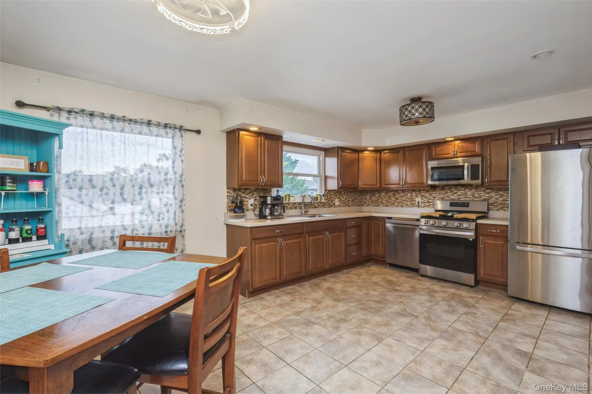 Second floor large kitchen with new stainless steel appliances and huge pantry room. Second floor large kitchen with new stainless steel appliances and huge pantry room.