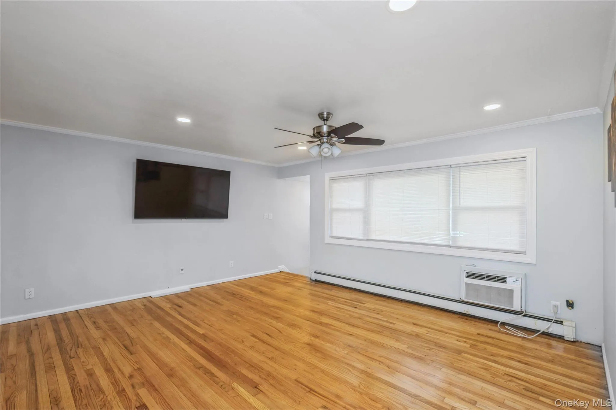 First floor living room with hardwood floors. First floor living room with hardwood floors.