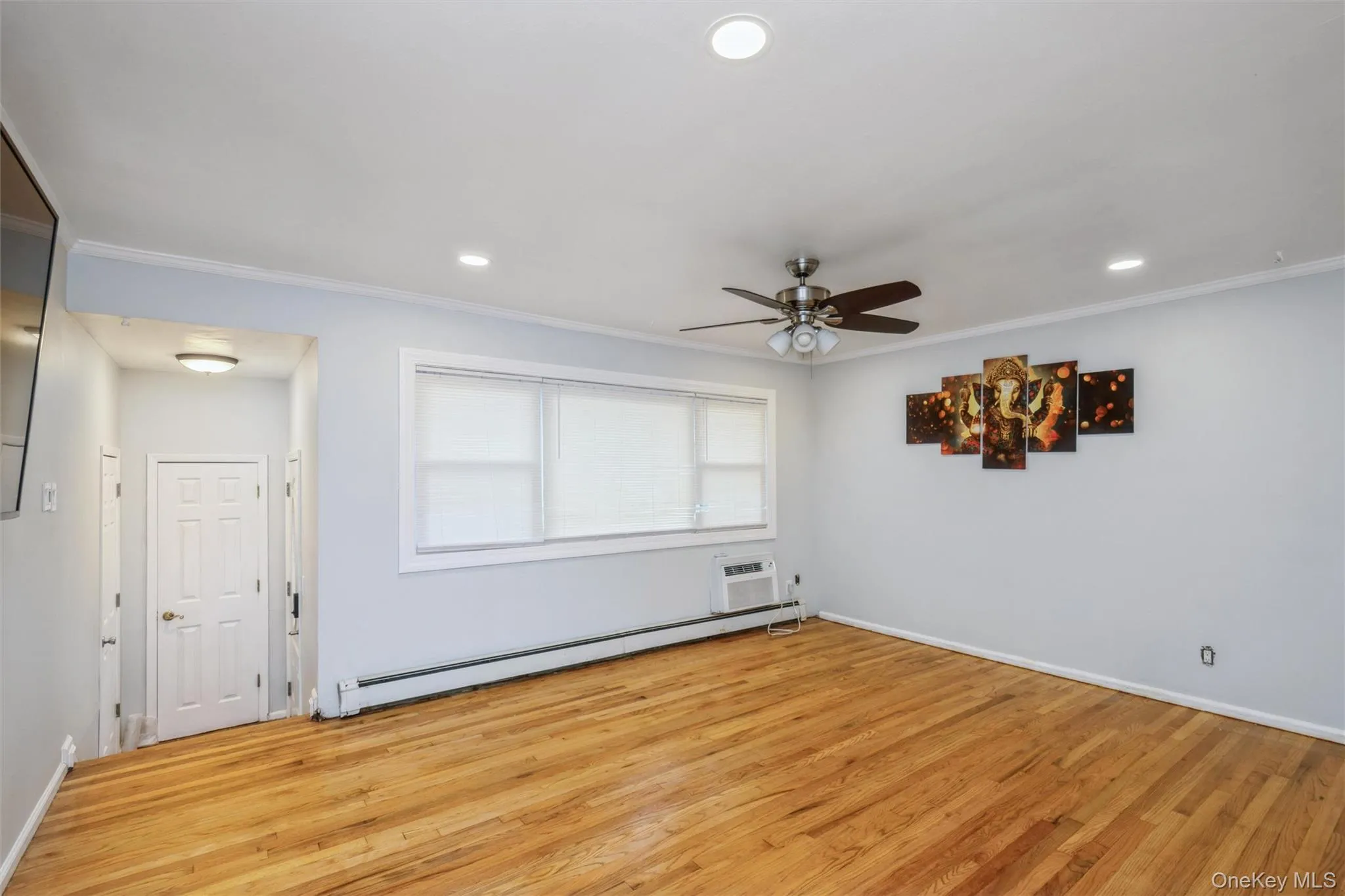 First floor living room with hardwood floors. First floor living room with hardwood floors.