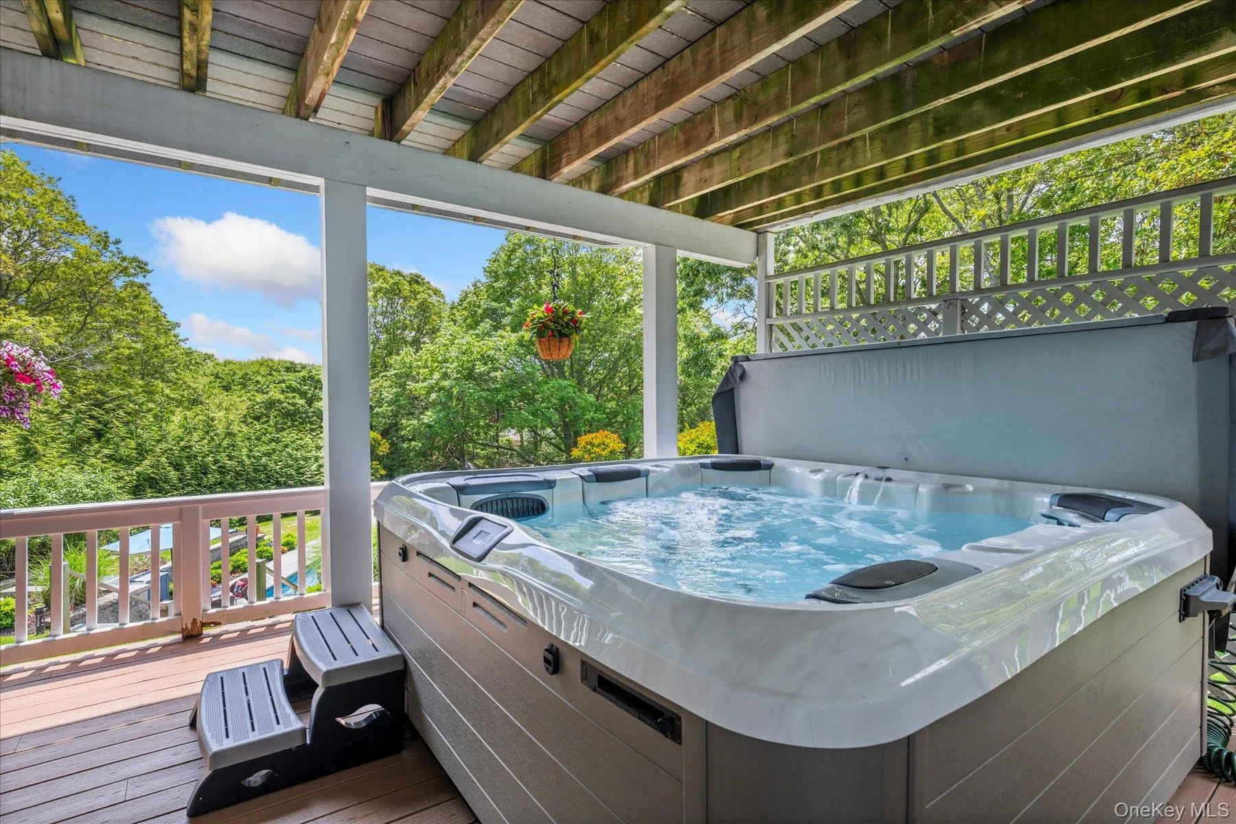 Wooden terrace with a hot tub Wooden terrace with a hot tub