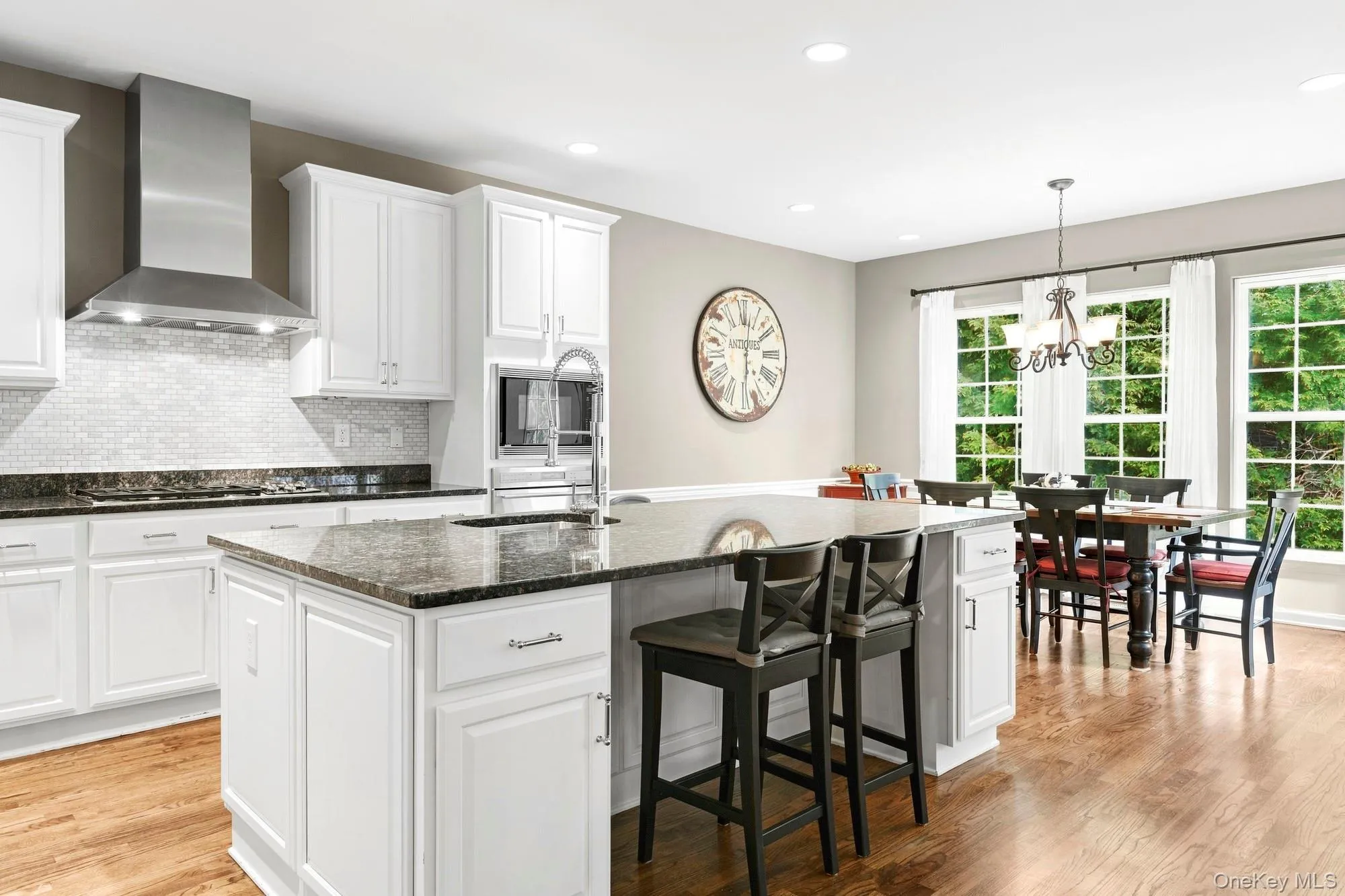 Kitchen view with kitchen dining area Kitchen view with kitchen dining area