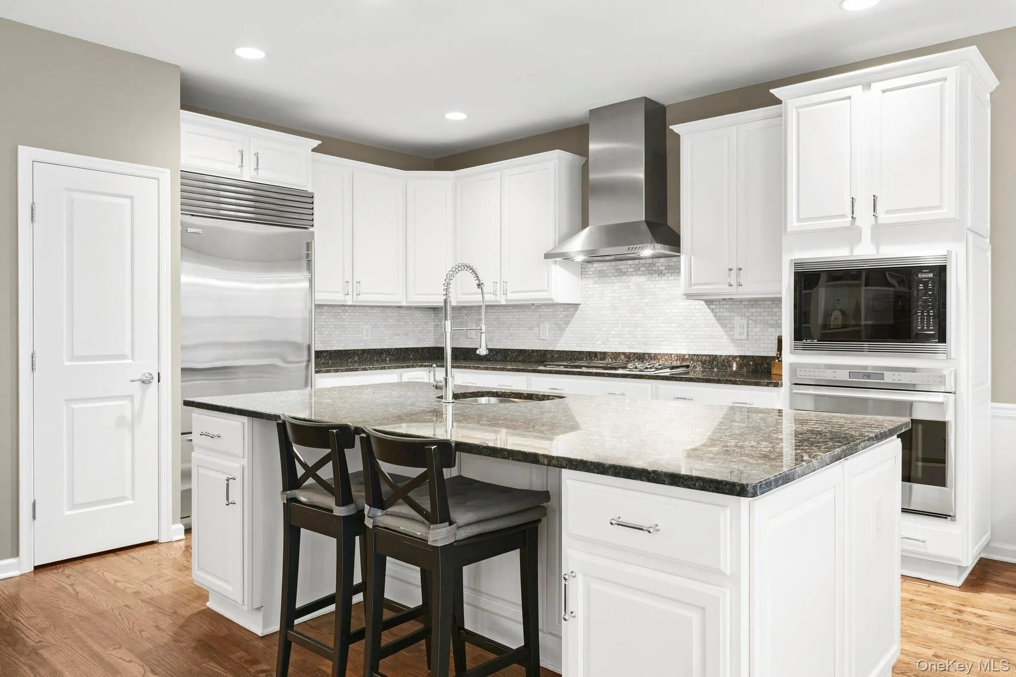 Beautiful kitchen with Granite Countertops and top of the line appliances. Wolf, Sub-Zero and Fisher Paykel Beautiful kitchen with Granite Countertops and top of the line appliances. Wolf, Sub-Zero and Fisher Paykel