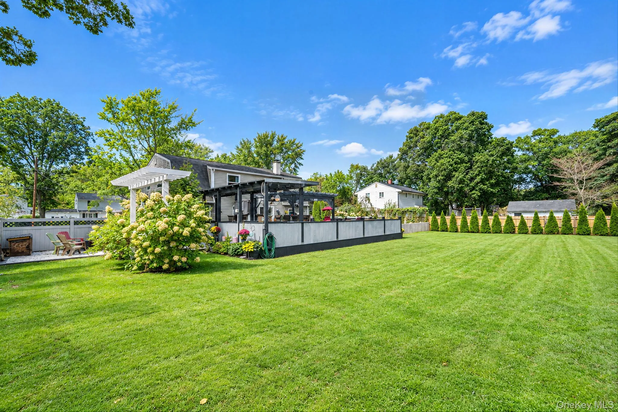 .35 Acre Lot, Large Deck, Shed, Hammock, Firepit, Pergola, Bar .35 Acre Lot, Large Deck, Shed, Hammock, Firepit, Pergola, Bar