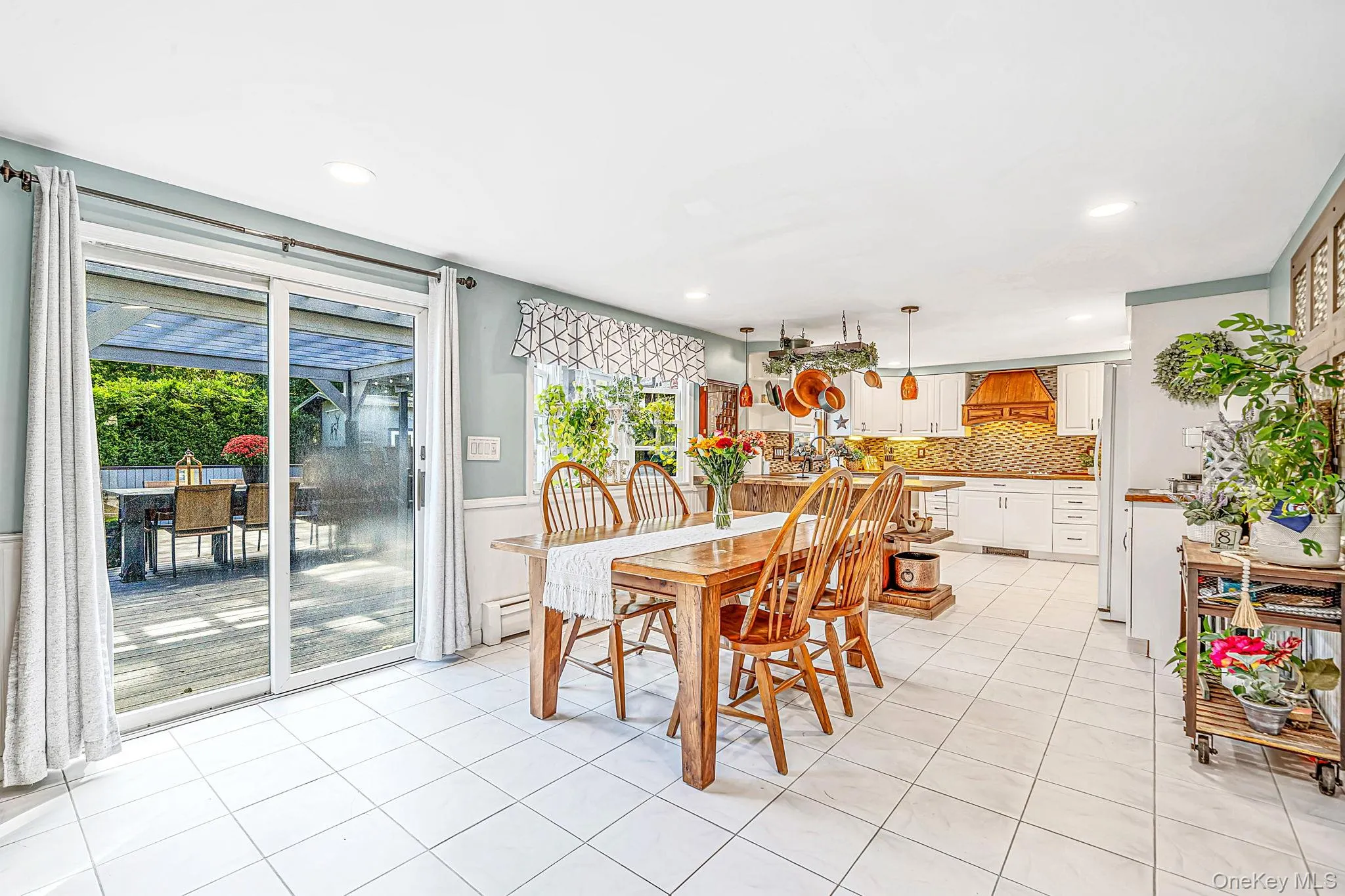 Dining Area with Open Flow to EIK, Sliders to Back Deck Dining Area with Open Flow to EIK, Sliders to Back Deck
