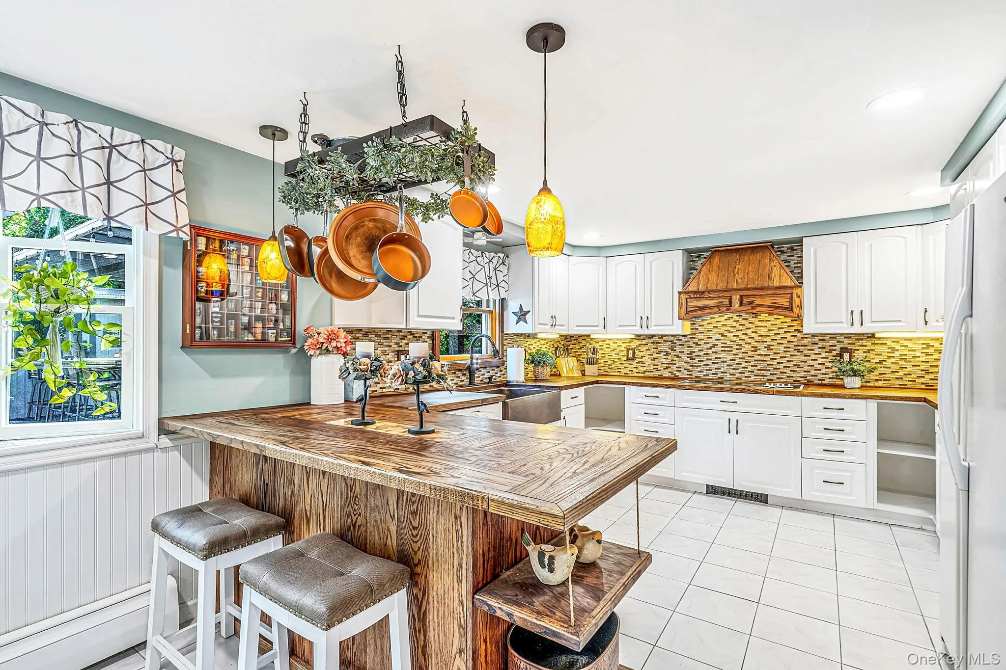 EIK with Butcher Block Countertops, Breakfast Peninsula, Double Oven, Copper Farmhouse Sink, Under Cabinet Lighting EIK with Butcher Block Countertops, Breakfast Peninsula, Double Oven, Copper Farmhouse Sink, Under Cabinet Lighting