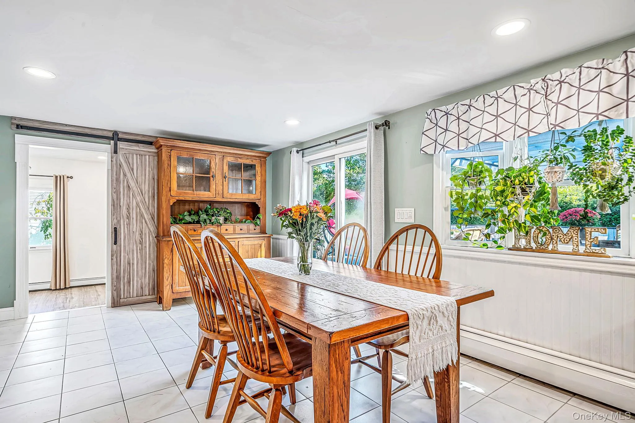 Dining Area with Open Flow to EIK, Sliders to Back Deck Dining Area with Open Flow to EIK, Sliders to Back Deck