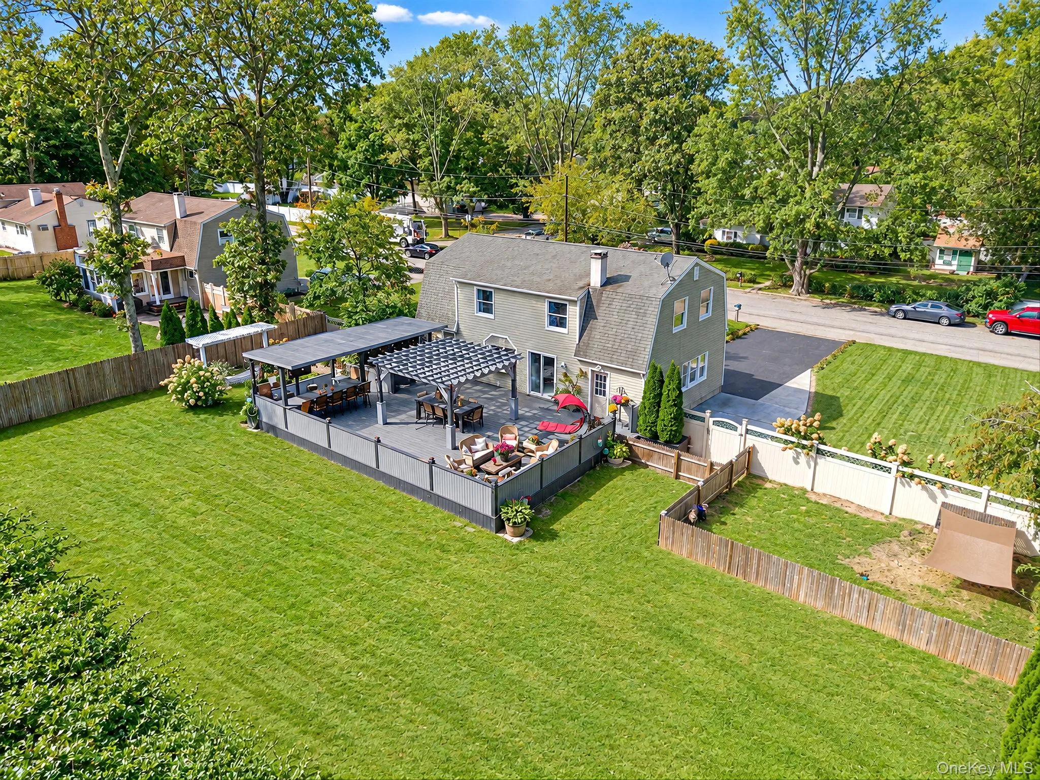 Dutch Colonial on .35 Acres, Newly Sealed Oversized Driveway, New Front Porch Dutch Colonial on .35 Acres, Newly Sealed Oversized Driveway, New Front Porch