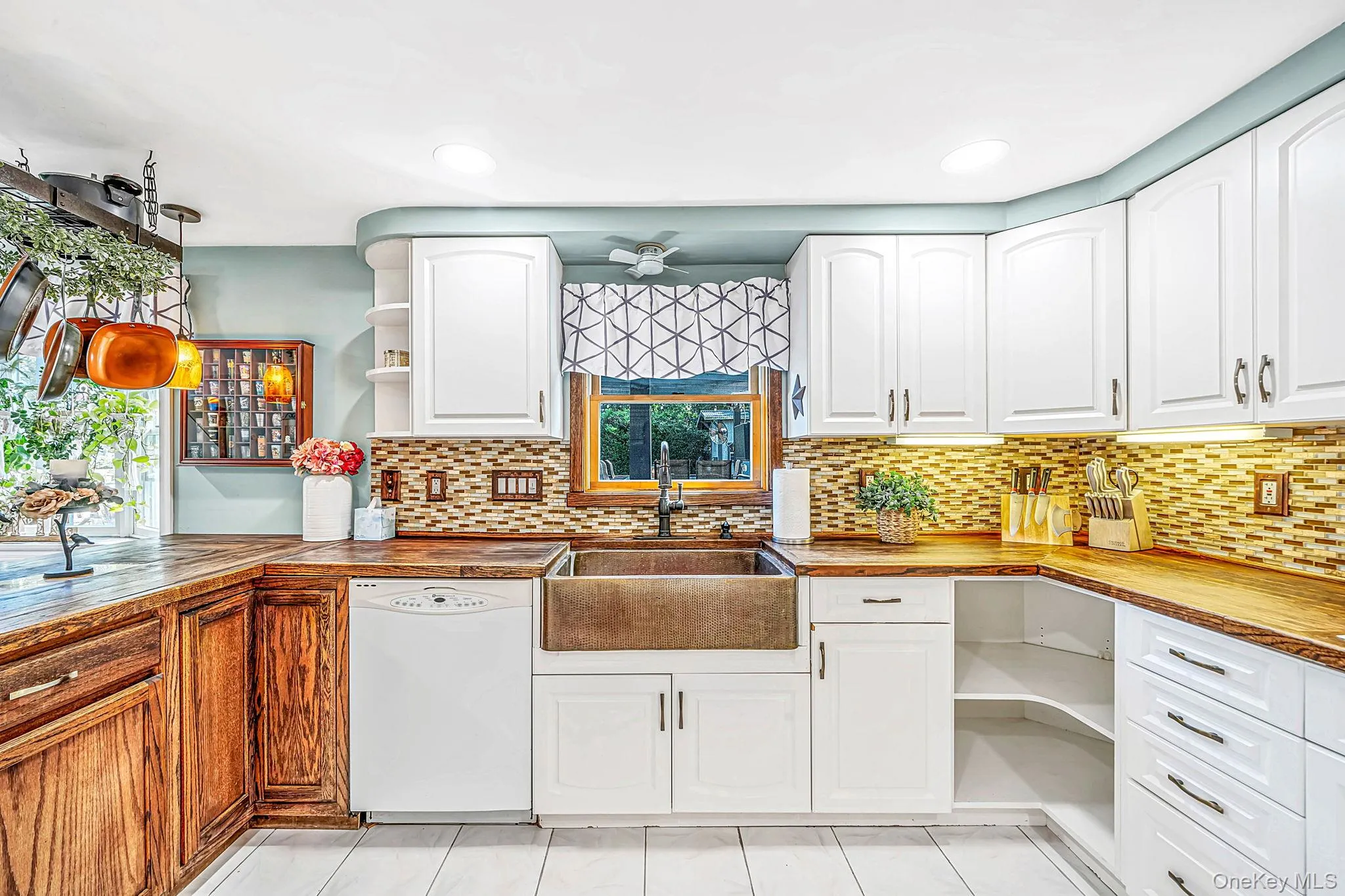 EIK with Butcher Block Countertops, Breakfast Peninsula, Double Oven, Copper Farmhouse Sink, Under Cabinet Lighting EIK with Butcher Block Countertops, Breakfast Peninsula, Double Oven, Copper Farmhouse Sink, Under Cabinet Lighting
