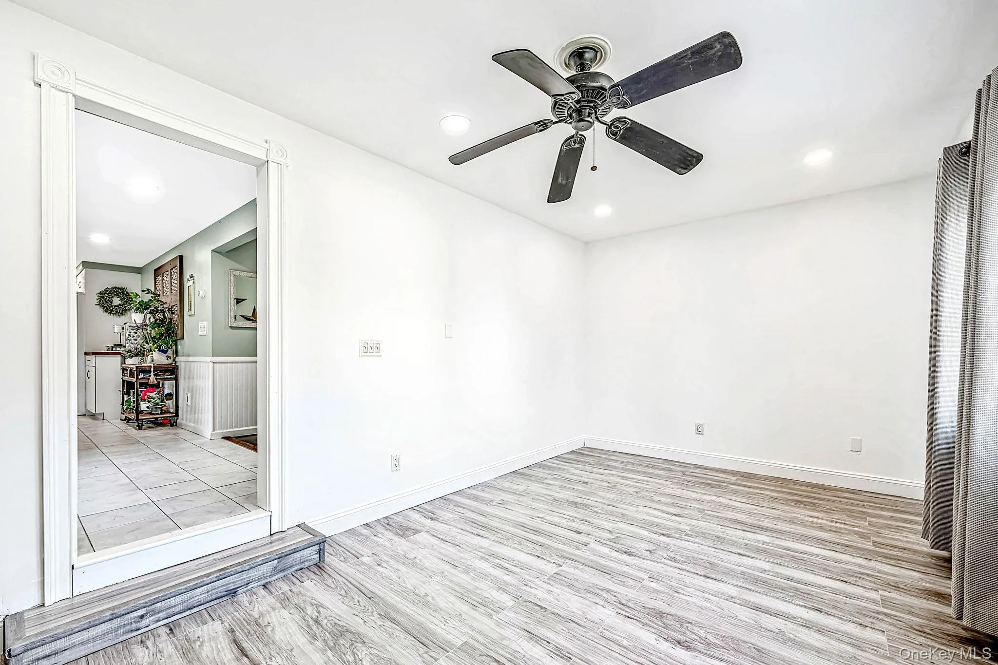 Den with New Vinyl Flooring, Recessed Lighting, Built in Bar with 2 Beverage Fridges Den with New Vinyl Flooring, Recessed Lighting, Built in Bar with 2 Beverage Fridges