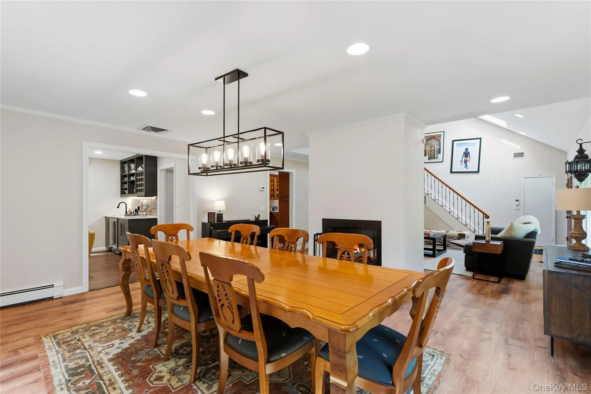 Dining Room with Fireplace, adjacent to Den and Living Room Dining Room with Fireplace, adjacent to Den and Living Room