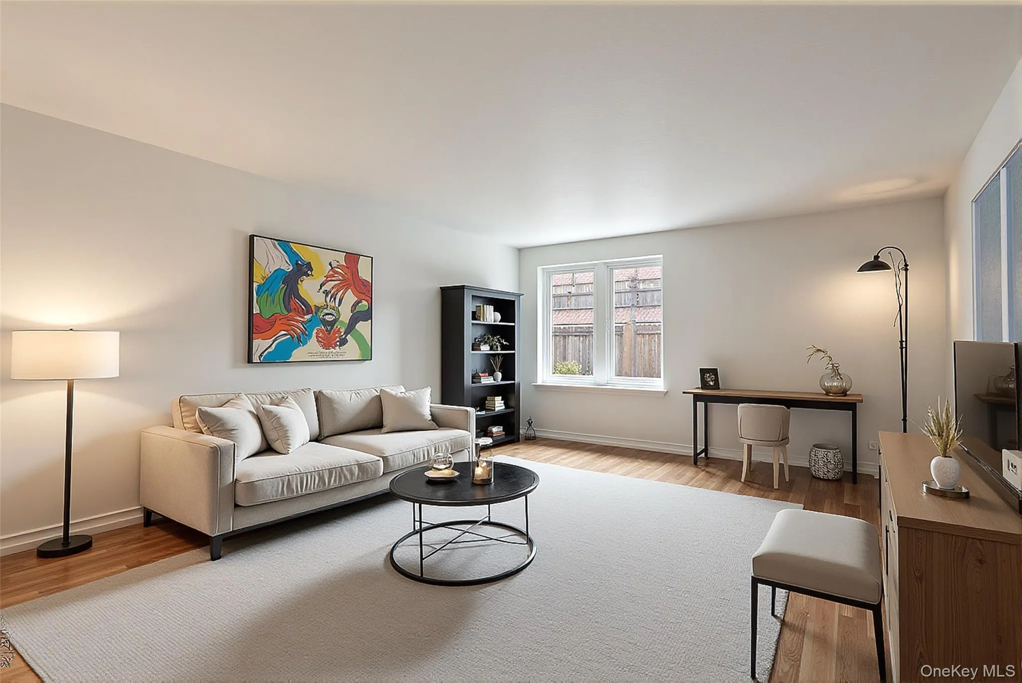 Living area featuring wood finished floors Living area featuring wood finished floors
