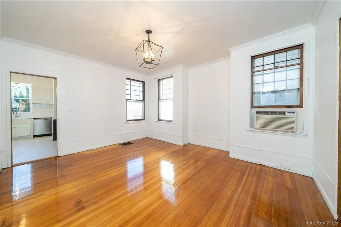 Formal Dining Room with new light fixtures and refinished hardwood floors as seen. Formal Dining Room with new light fixtures and refinished hardwood floors as seen.