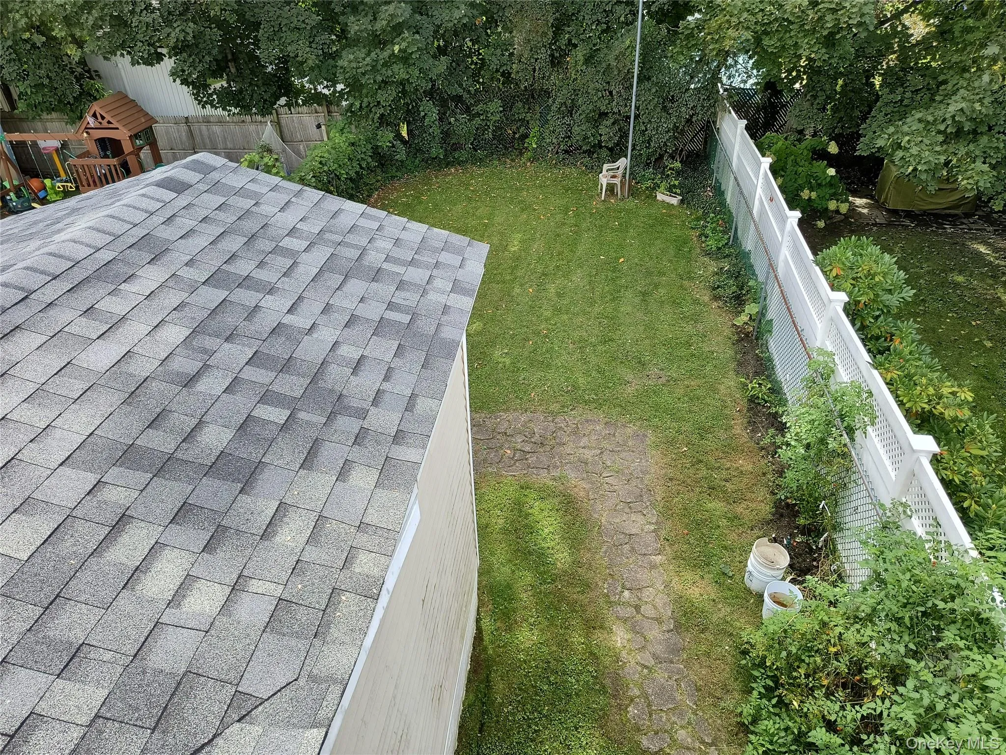 The yard as seen from the balcony The yard as seen from the balcony