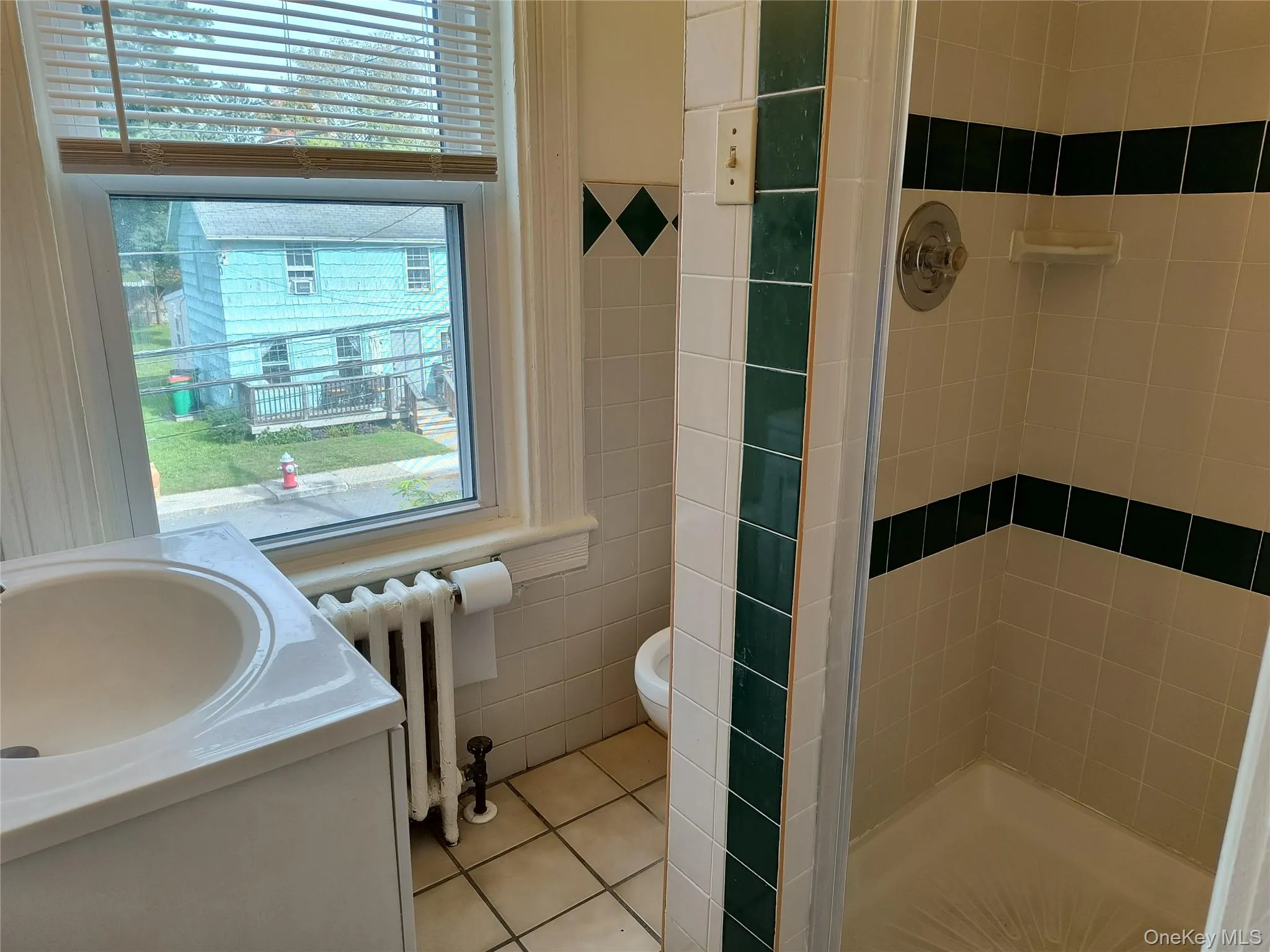 Tiled shower stall Tiled shower stall