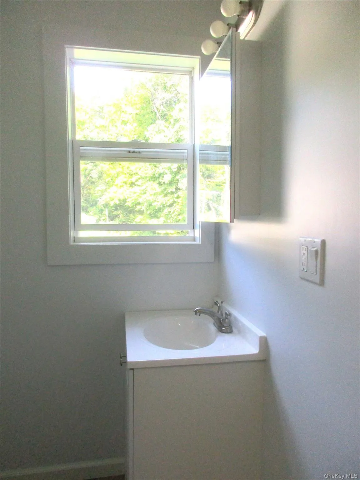 Sink and bathroom window Sink and bathroom window