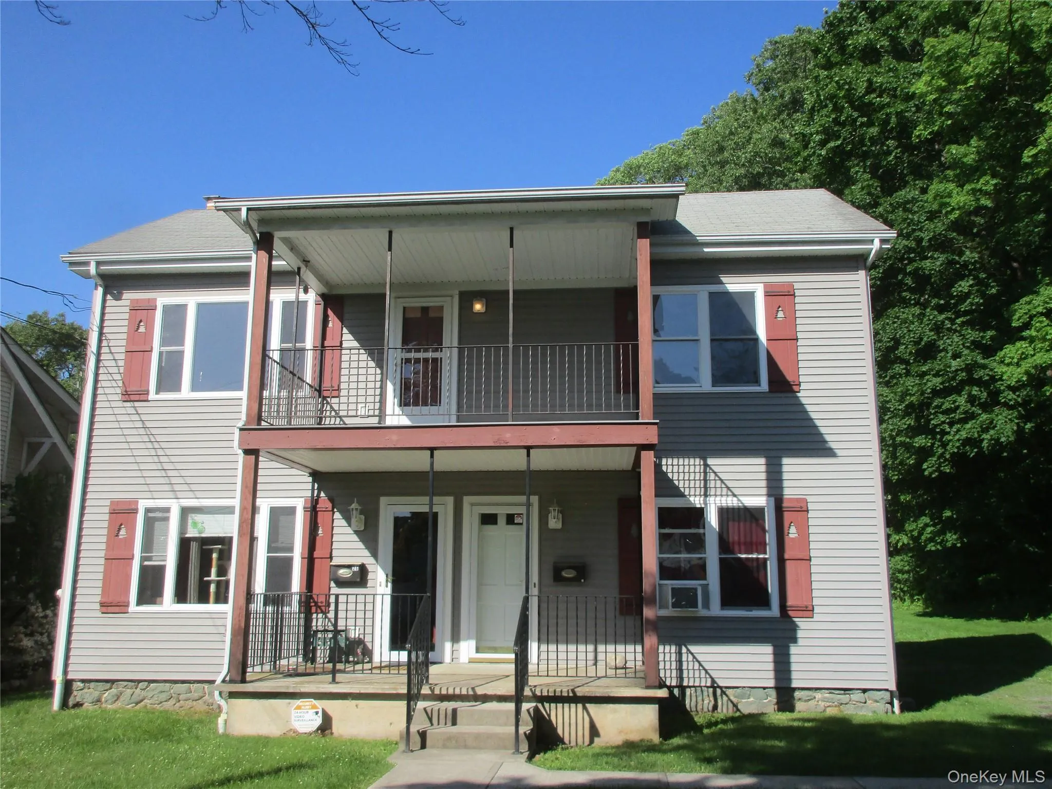 Picture of building with 2 apartments door on left is to first floor apt. and one on right goes to upstairs apt. Picture of building with 2 apartments door on left is to first floor apt. and one on right goes to upstairs apt.