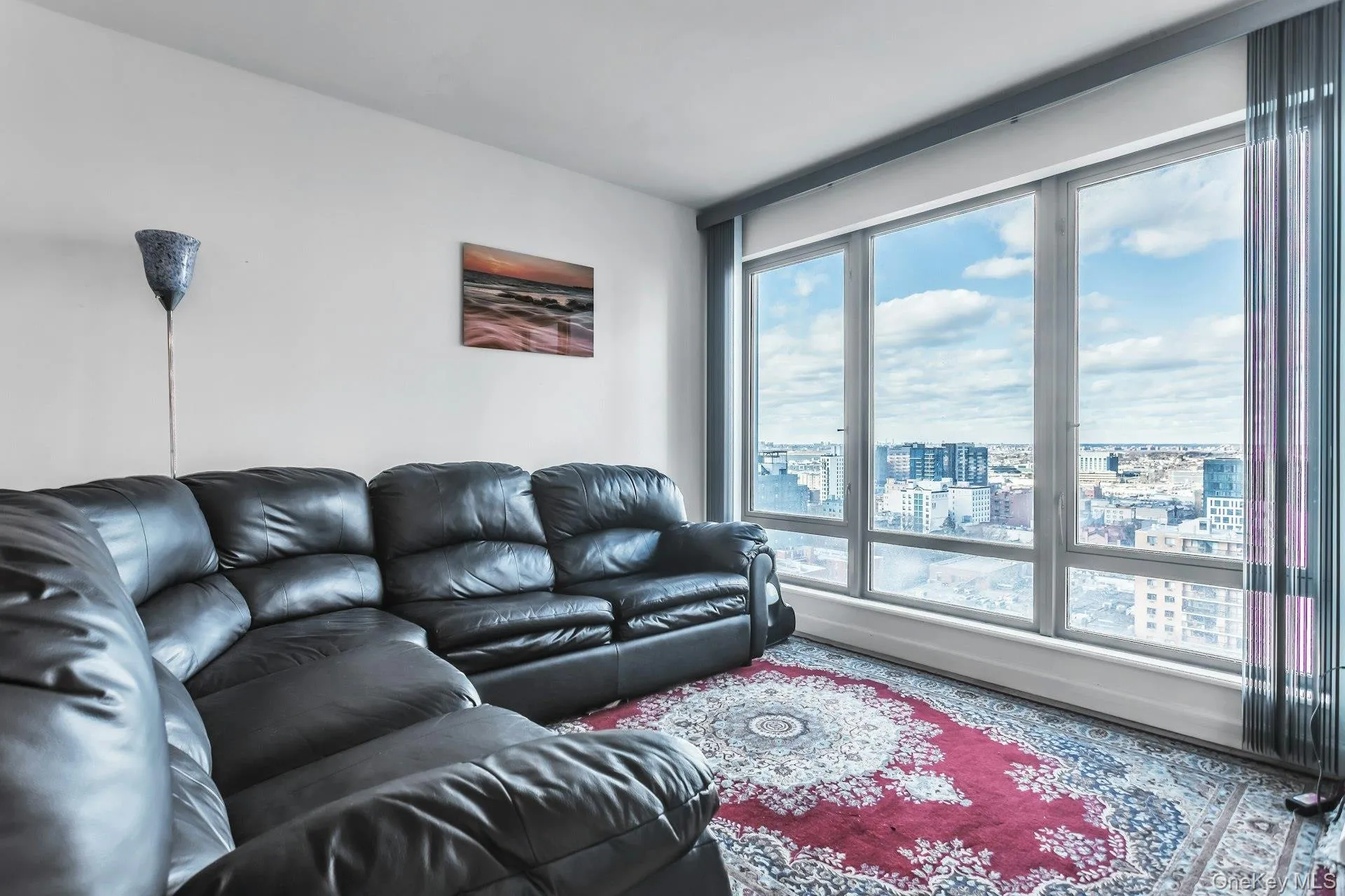Living room with a view of city Living room with a view of city