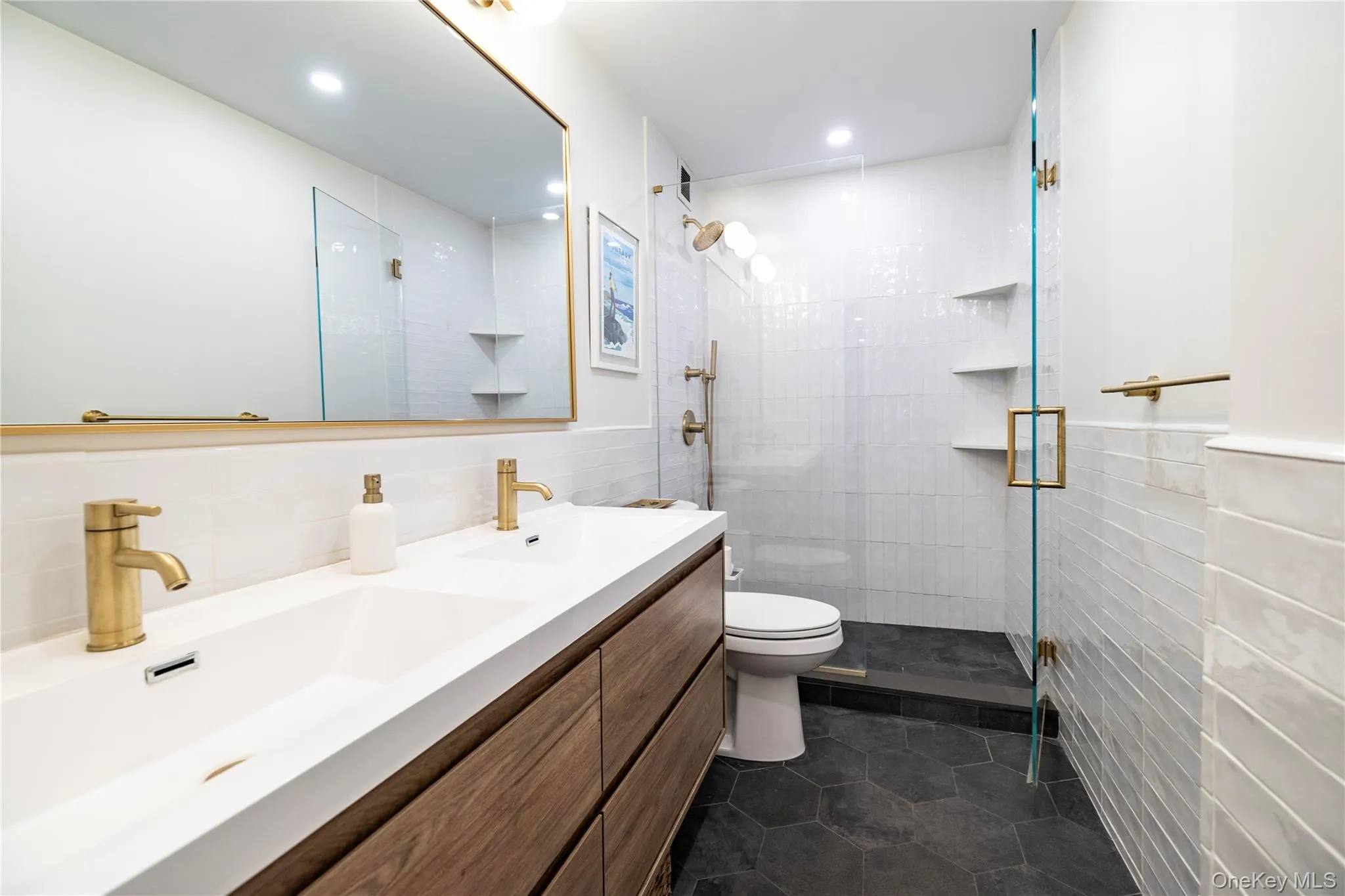 En suite bathroom, newly updated with doulbe vanity and glass shower doors En suite bathroom, newly updated with doulbe vanity and glass shower doors