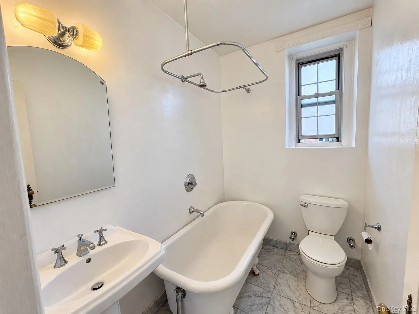 Antique Clawfoot porcelain tub, marble floors Antique Clawfoot porcelain tub, marble floors