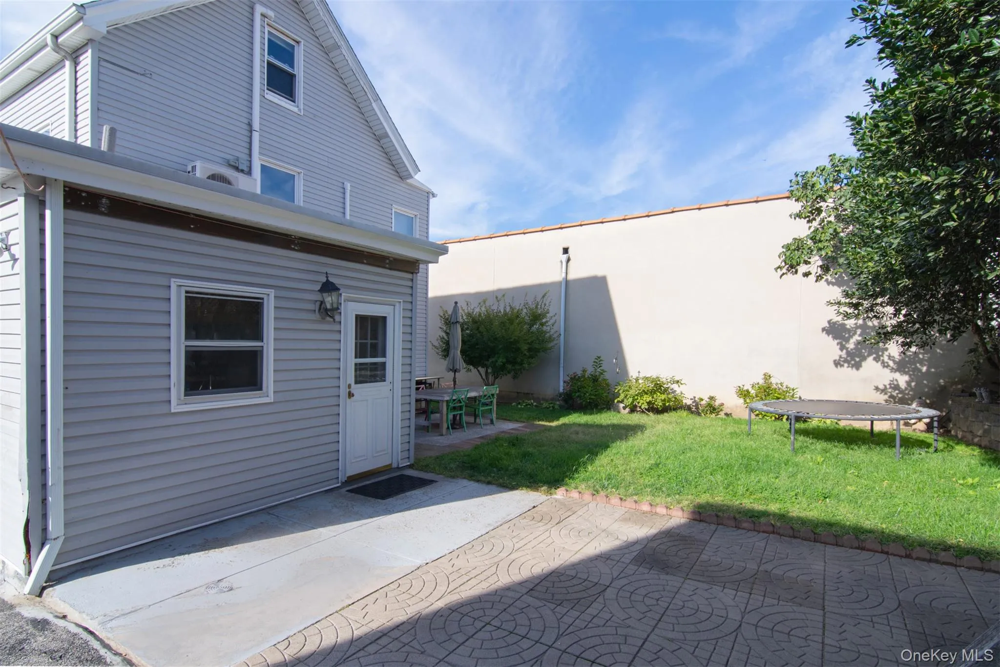 Backyard featuring 2 patios Backyard featuring 2 patios