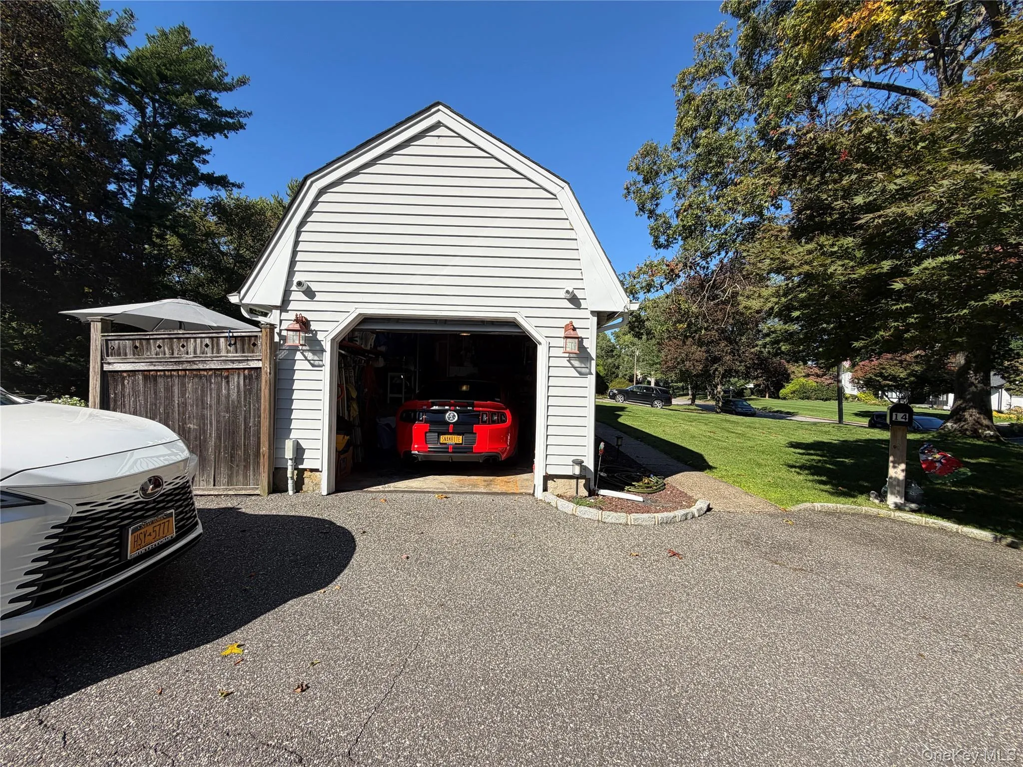 Dutch Colonial, garage entrance, with interior door, as well as door to backyard Dutch Colonial, garage entrance, with interior door, as well as door to backyard