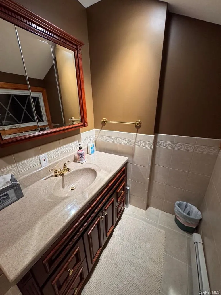 Half bath, upstairs hallway, toilet and sink, can be made to be a full bath Half bath, upstairs hallway, toilet and sink, can be made to be a full bath