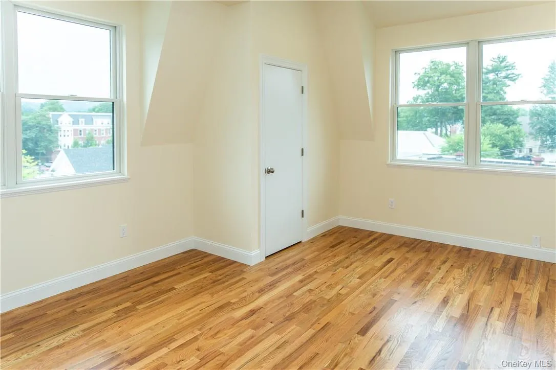 Corner bedroom with two sets of windows. Corner bedroom with two sets of windows.