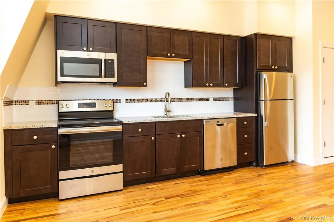 GE stainless steel appliances: Range, refrigerator, microwave and dishwasher. GE stainless steel appliances: Range, refrigerator, microwave and dishwasher.