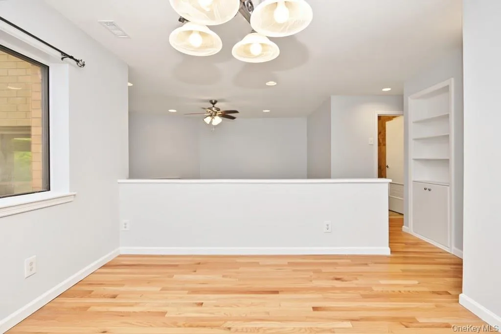 Large well lit dining room directly off of kitchen Large well lit dining room directly off of kitchen