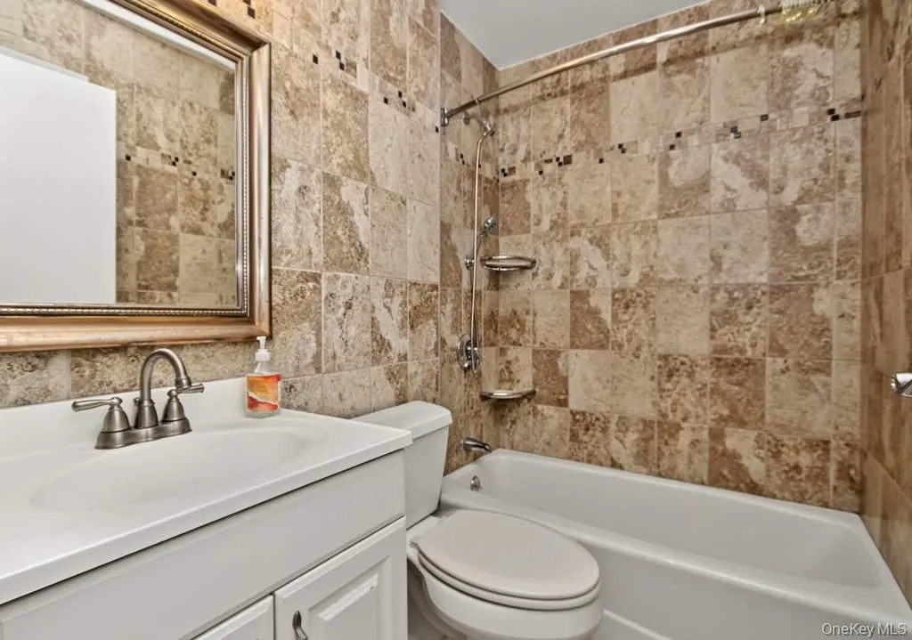 First floor full hallway bathroom. First floor full hallway bathroom.