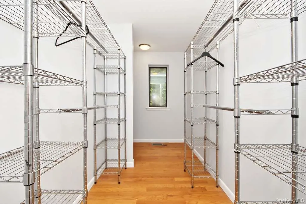 Huge walk-in closet in the primary bedroom Huge walk-in closet in the primary bedroom