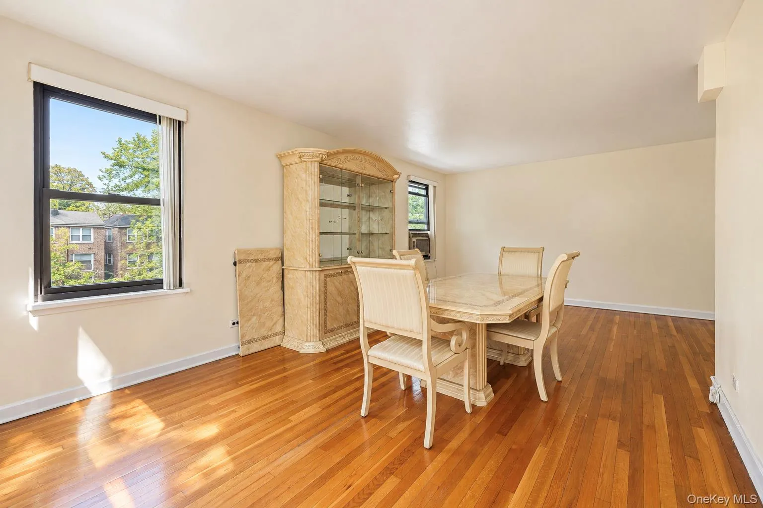 Dining Area with hardwood flooring Dining Area with hardwood flooring