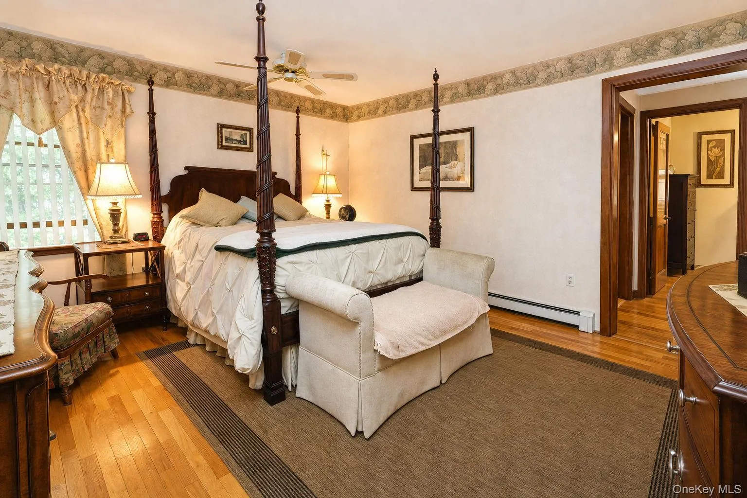 Hardwood flooring, ceiling fan, and decorative trim Hardwood flooring, ceiling fan, and decorative trim