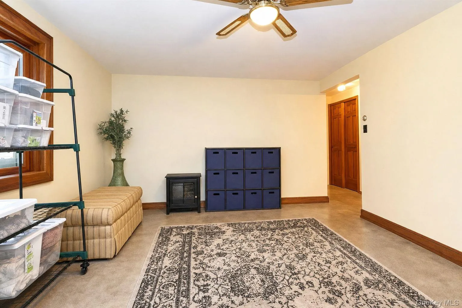 Neutral wall paint, wood-finish window trim, ceiling fan light fixture, and 6 panel wood doors, Neutral wall paint, wood-finish window trim, ceiling fan light fixture, and 6 panel wood doors,