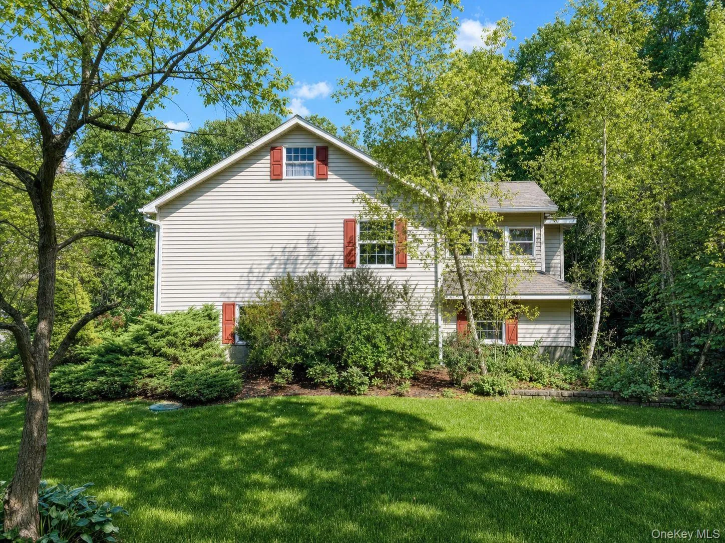Manicured lawn and mature foliage Manicured lawn and mature foliage