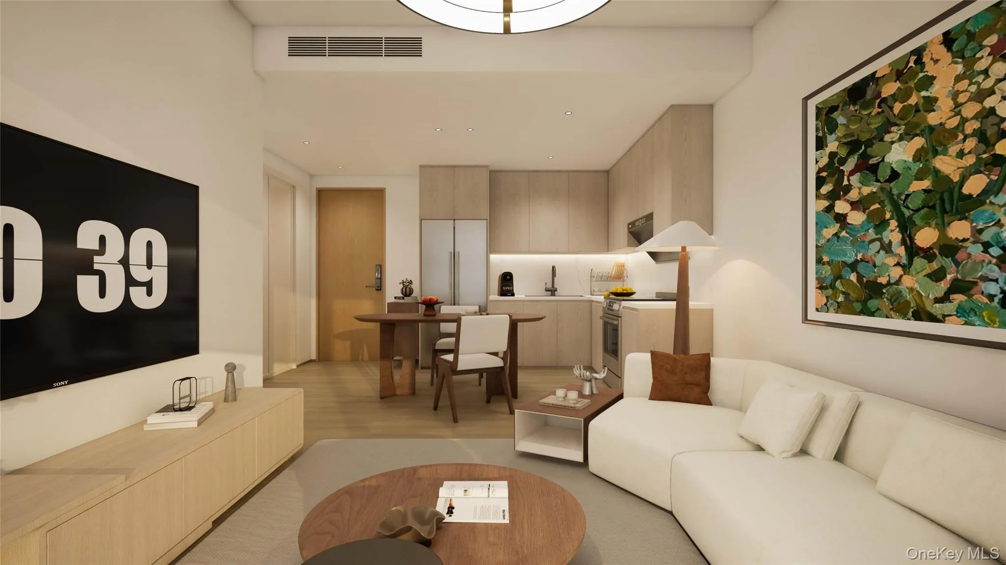 Living room featuring light wood-style floors and recessed lighting Living room featuring light wood-style floors and recessed lighting