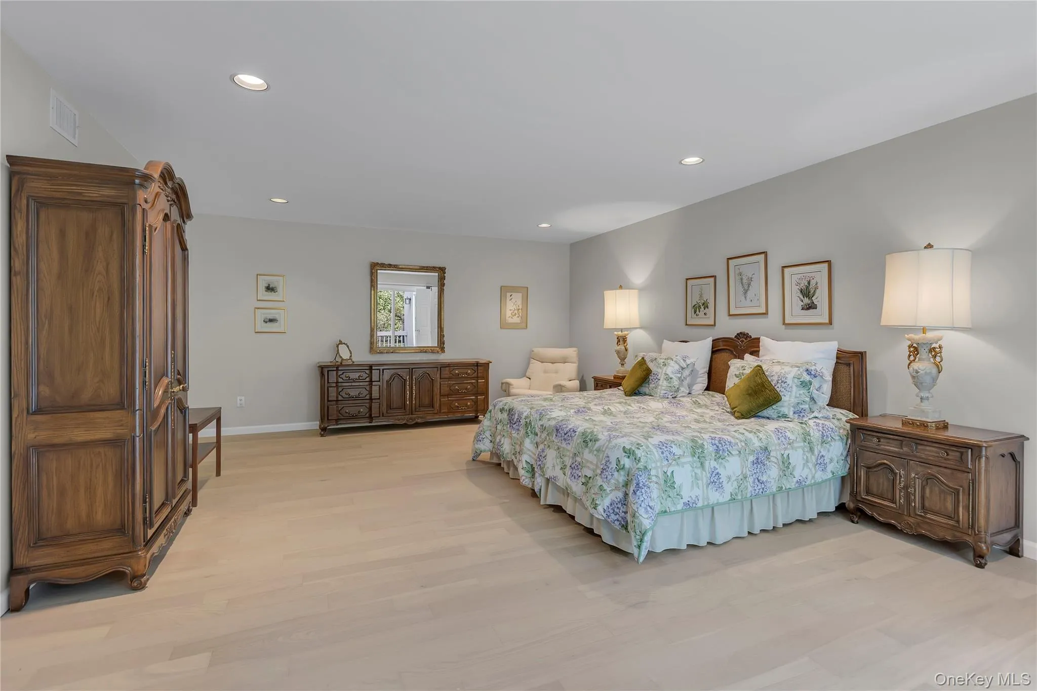 Spacious Primary bedroom featuring light-colored new carpeting and recessed lighting. Spacious Primary bedroom featuring light-colored new carpeting and recessed lighting.
