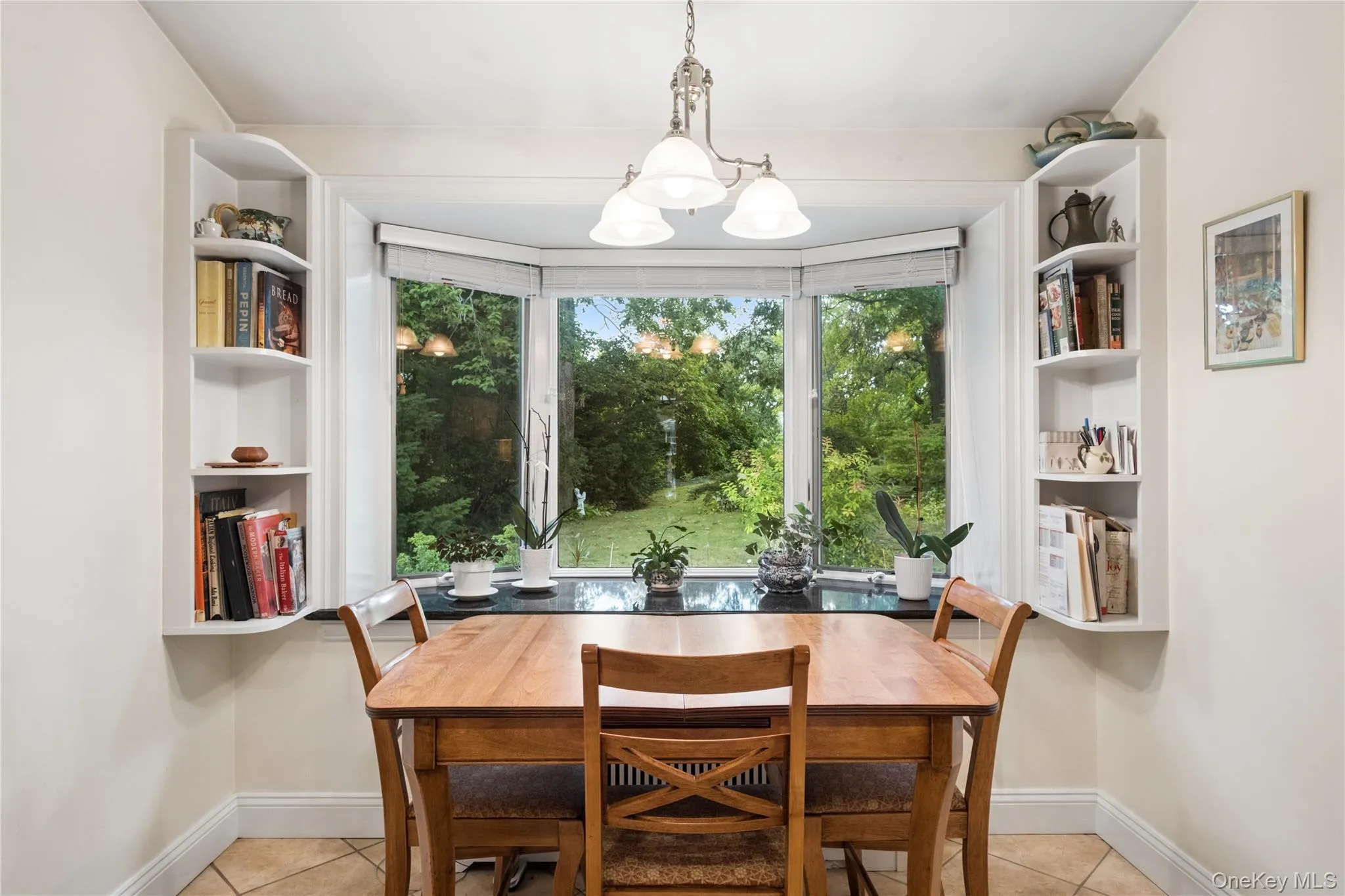 Kitchen dining area has view of backyard Kitchen dining area has view of backyard