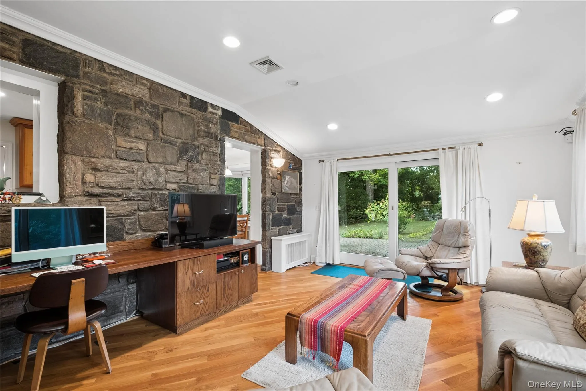 Family room has large sliding glass door to the backyard Family room has large sliding glass door to the backyard