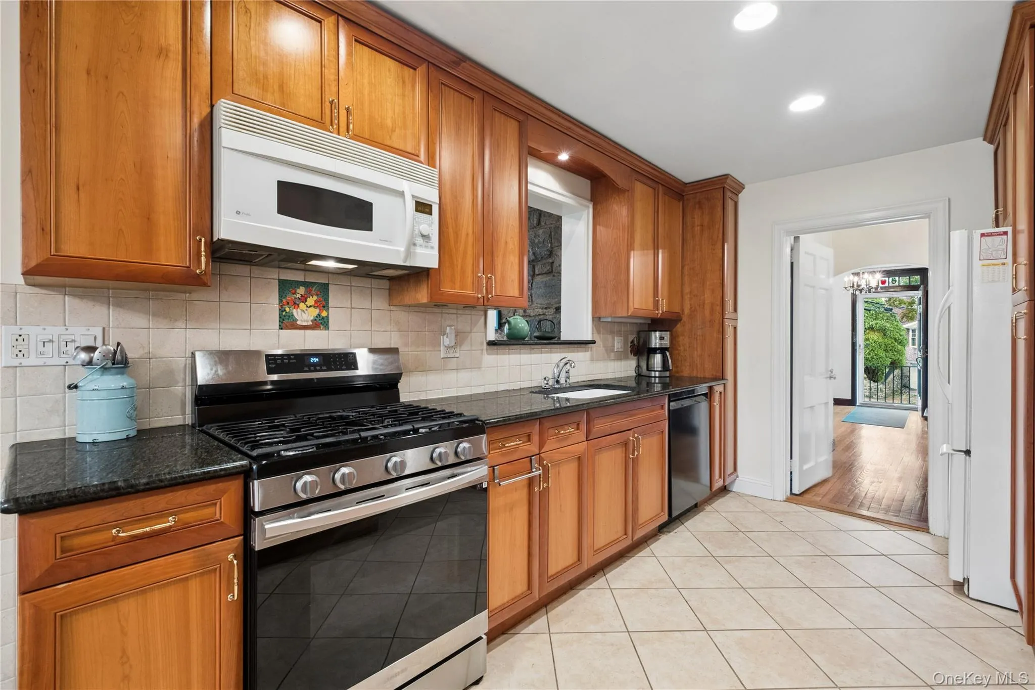 Kitchen with Gas Range, Microwave & Dishwasher Kitchen with Gas Range, Microwave & Dishwasher