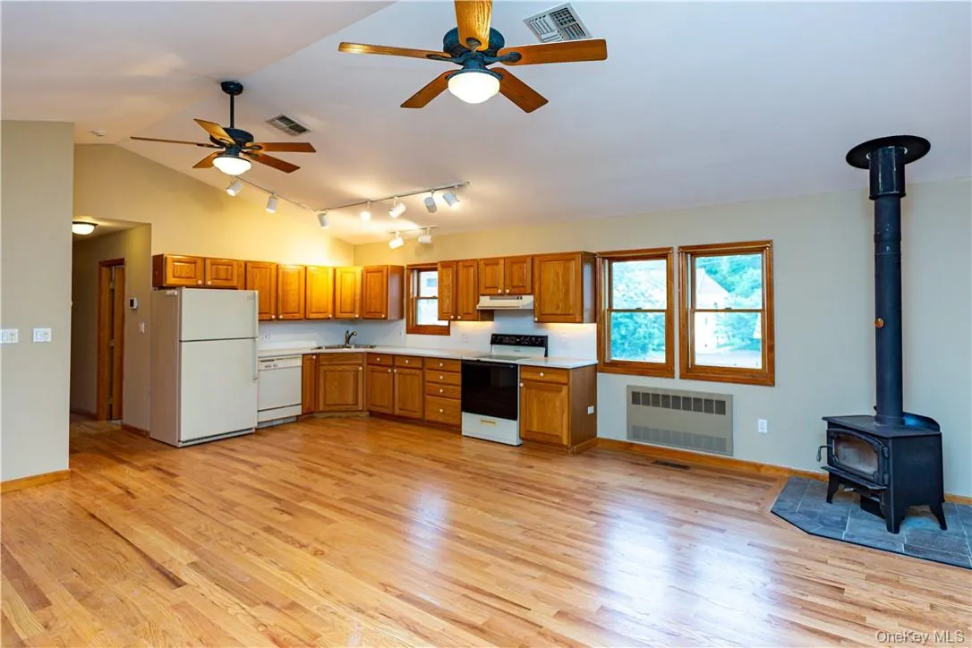 The kitchen features an abundance of cabinetry and counter space. The kitchen features an abundance of cabinetry and counter space.