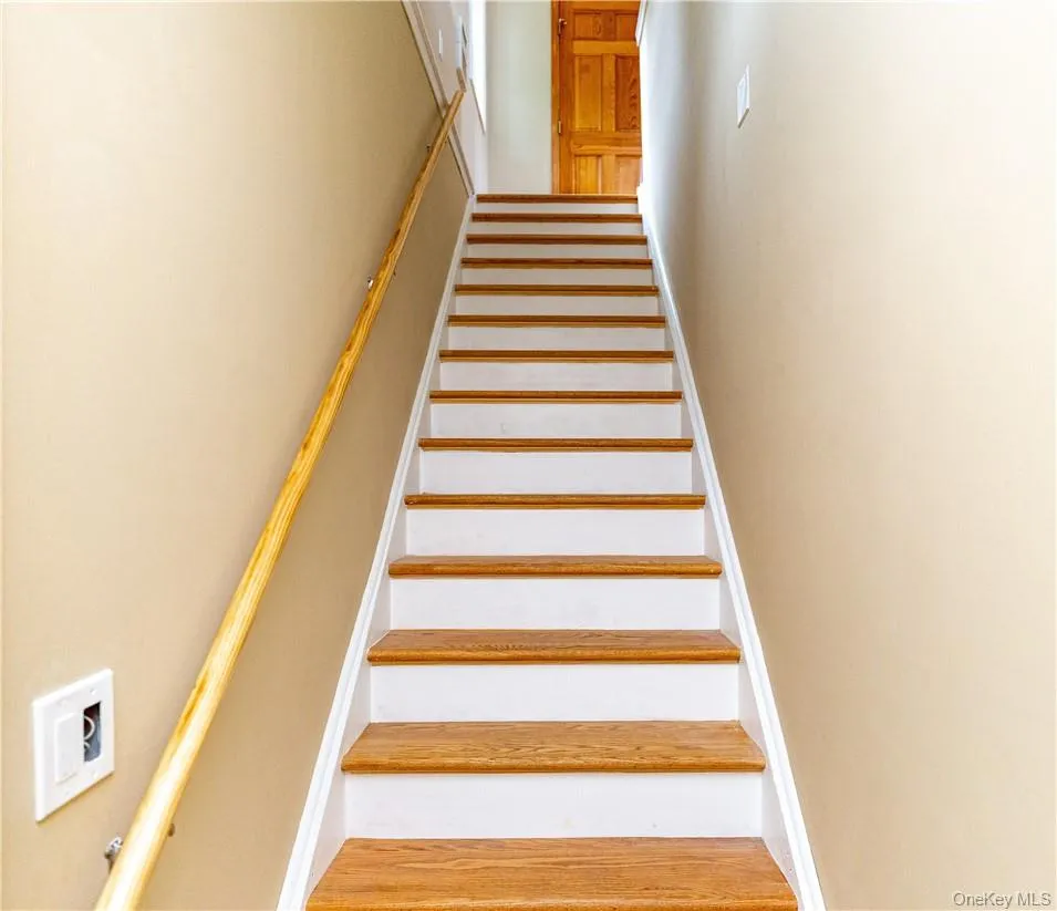 The staircase leading to the second floor top apartment. The staircase leading to the second floor top apartment.