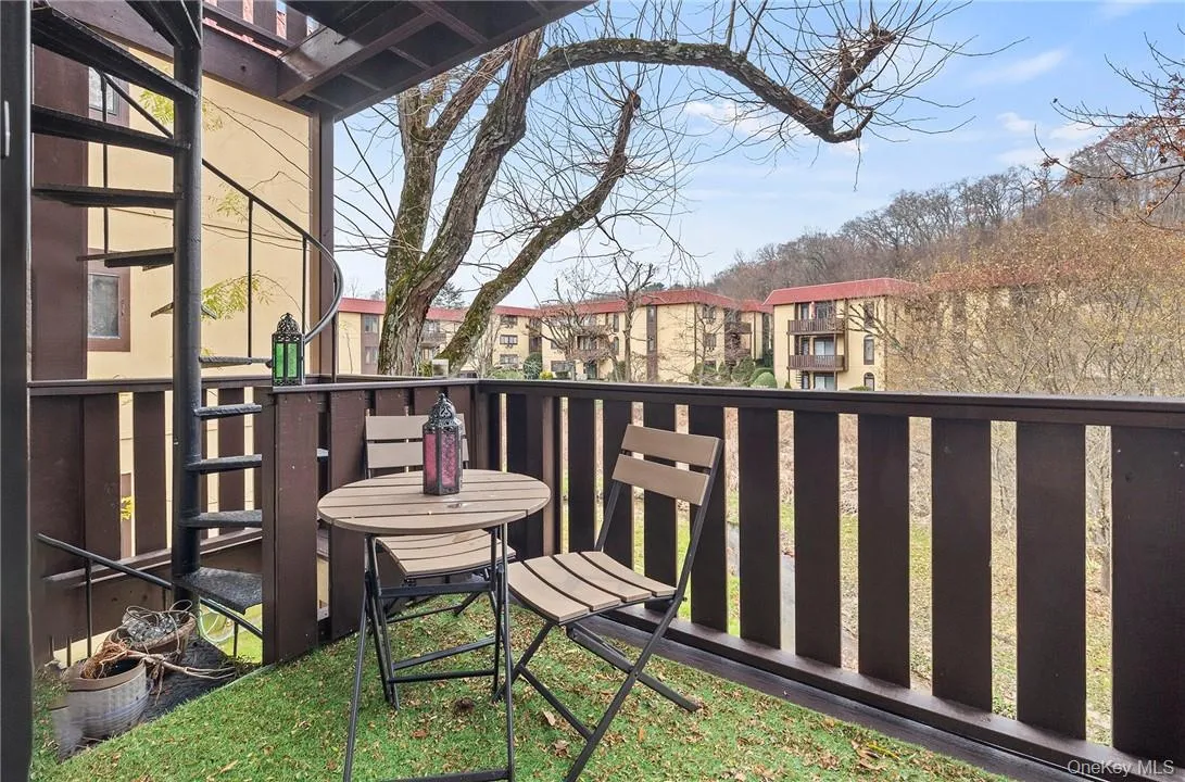 PATIO with view of the trees and brook. PATIO with view of the trees and brook.