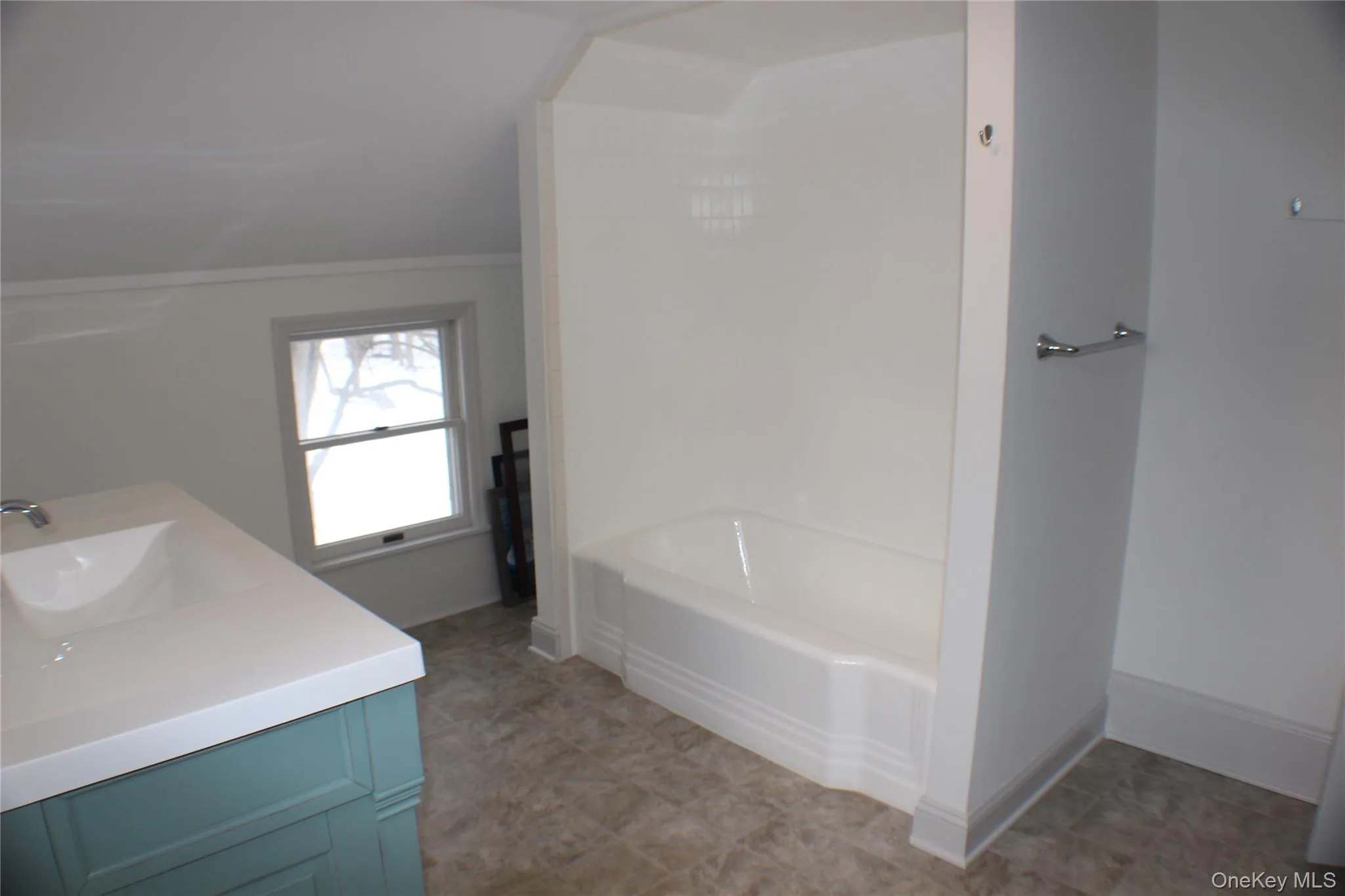 Full bathroom with vanity and a tub Full bathroom with vanity and a tub