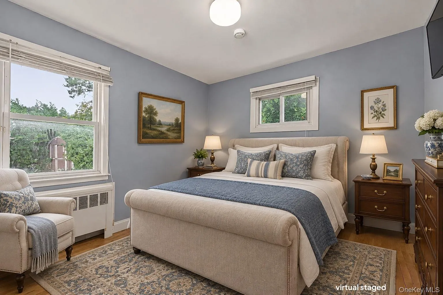 Virtually staged second bedroom located on the first floor Virtually staged second bedroom located on the first floor